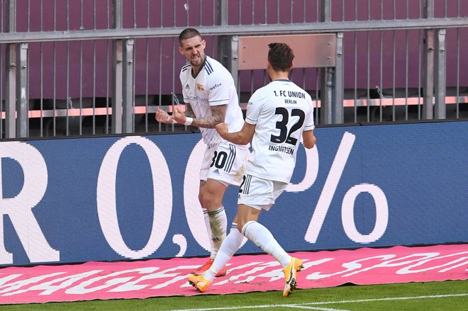 Union Berlin je v Münchnu pripravil presenečenje, izenačujoči gol za točko proti prvaku Bayernu je priigral Danec Marcus Ingvartsen. FOTO: Andreas Gebert/AFP