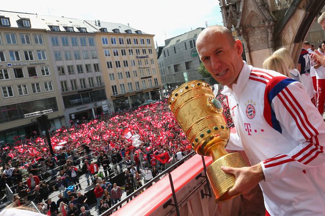 München je pravo nogometno mesto, kar je občutil tudi Arjen Robben, nekdanji Bayernov as iz Nizozemske. FOTO: Alexander Hassenstein/AFP