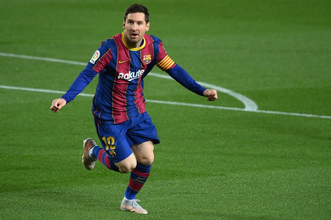Lionel Messi je dvakrat zatresel mrežo Getafeja in zagrozil vodilnima. Foto Lluis Gene/AFP