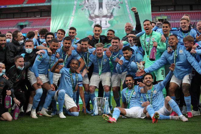 Manchester City je v finalu angleškega ligaškega pokala premagal Tottenham in se že četrtič zapored veselil zmagoslavja v tem tekmovanju. FOTO: Carl Recine/AFP