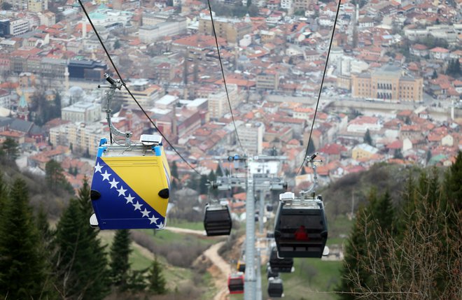 The Trebevic cable car is seen above the city of Sarajevo during a test drive following the restoration of the line after 26 years, Bosnia and Herzegovina, April 4, 2018. Picture taken April 4, 2018. REUTERS/Dado Ruvic - RC1840702E10