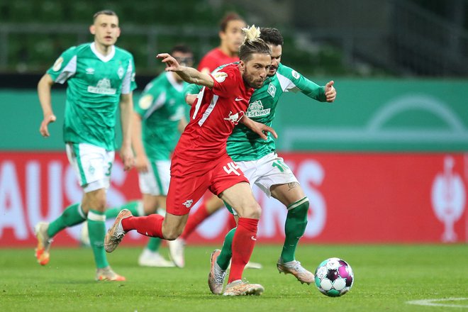 Kevin Kampl se je z Leipzigom zanesljivo uvrstil v ligo prvakov. FOTO: Cathrin Müller/AFP