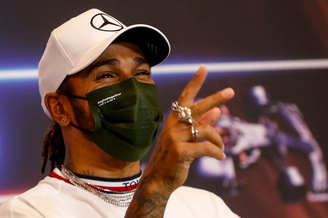 Lewis Hamilton se veseli spektakularne dirke v Monte Carlu. FOTO: Sebastien Nogier/AFP