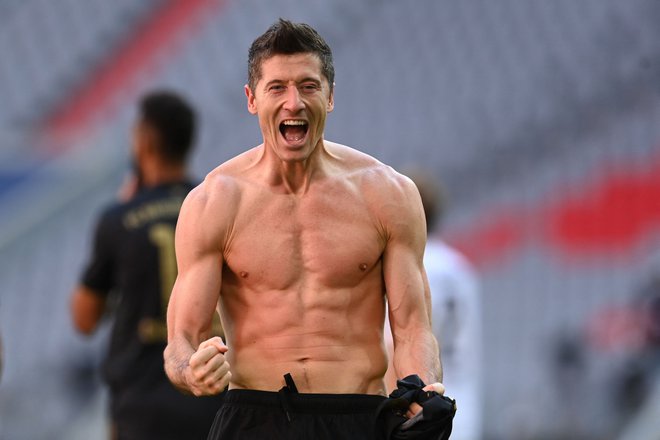 Robert Lewandowski se je iskreno veselil svojega 41. gola v tej sezoni bundeslige. FOTO: Christof Stache/AFP