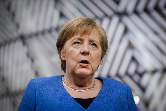 »Vse druge razlage za pristanek so povsem neverodostojne,« je ob prihodu na vrh povedala nemška kanclerka Angela Merkel. FOTO: Olivier Hoslet/Reuters