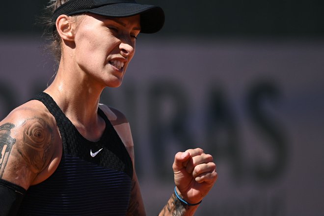 Polona Hercog se je takole veselila uvodne zmage v Roland Garrosu. FOTO: Anne-christine Poujoulat/AFP
