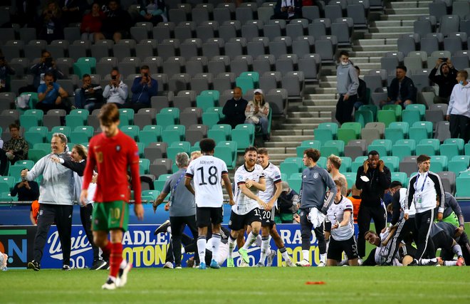 Veselje v nemškem taboru po naslovu evropskega prvaka. FOTO: Borut Zivulovic/Reuters