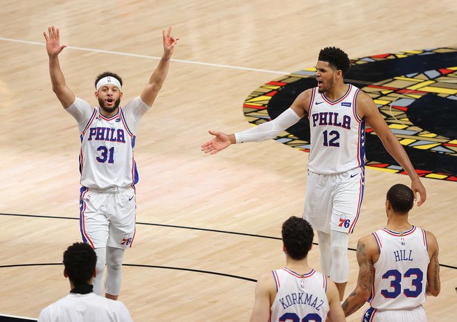 Seth Curry in Tobias Harris sta prinesla zmago Philadelphii. FOTO:&nbsp;Kevin C. Cox/AFP