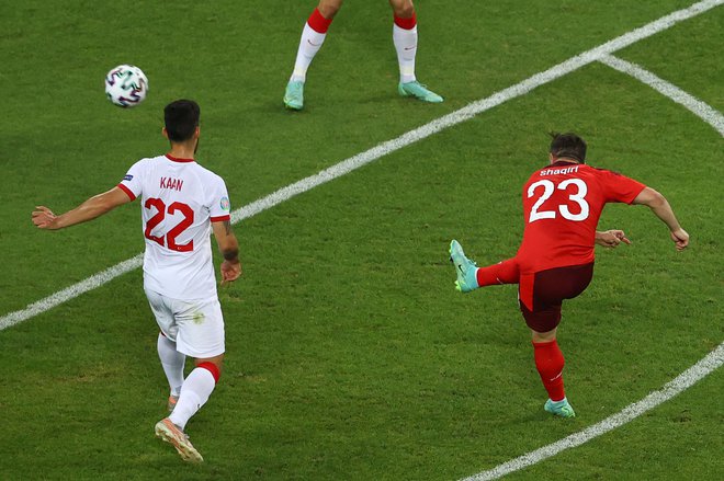 Xherdan Shaqiri je dosegel drugi zadetek za Švico. FOTO: Naomi Baker/AFP