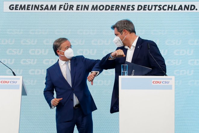 Predsednik CDU in kanclerski kandidat Armin Laschet in predsednik CSU Markus Söder sta danes podpisala predvolilni program CDU/CSU.<br />
FOTO: Michele Tantussi/AFP