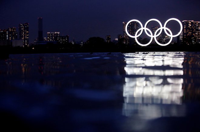 Izvedba olimpijskih iger v Tokiu na Japonskem znova sproža veliko polemik .  FOTO: Kim Kyung-hoon Reuters