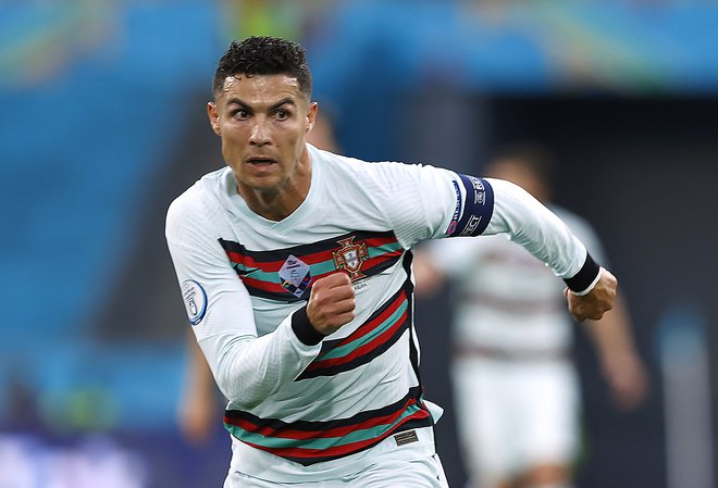 Cristiano Ronaldo med tekmo Portugalske in Belgije. FOTO: Marcelo Del Pozo/Reuters