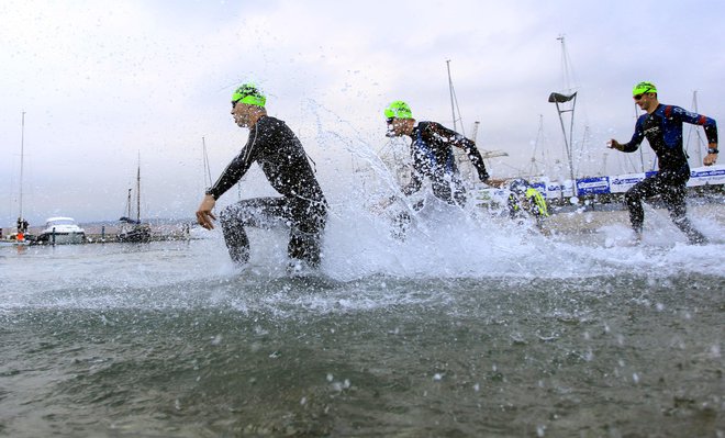 Ironman, licenčna prireditev v triatlonu, se bo po napovedih odvila predzadnji konec tedna v septembru. Foto Roman Šipić/Delo