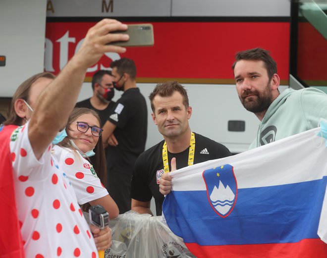 Andrej Hautpman (v sredini) se nadeja, da bodo slovenski navijači zadovoljni z razpletom olimpijske cestne dirke. FOTO: Dejan Javornik