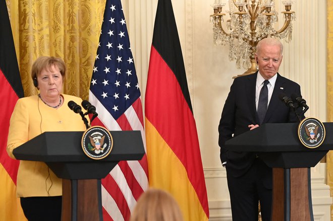 S prihodom ameriškega predsednika Joeja Bidena (ob njem kanclerka Angela Merkel) sta državi presekali gordijski vozel Severni tok 2. FOTO: Saul Loeb/AFP