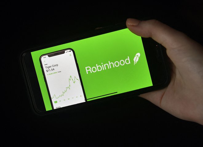 Robinhood želi izkoristiti čas, ko so vlagatelji naklonjeni prvim prodajam tehnoloških delnic. FOTO: Olivier Douliery/AFP