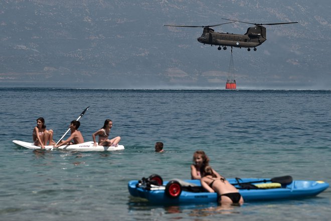 Grčijo sicer gozdni požari prizadenejo vsako poletje, a strokovnjaki opozarjajo, da so zaradi globalnega segrevanja vse pogostejši in obsežnejši. FOTO: Louisa Gouliamaki/AFP