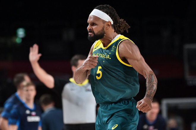 Patty Mills je Avstralce popeljal do brona. FOTO: Aris Messinis/AFP