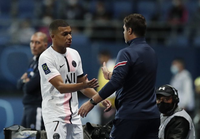 Mbappe (levo) tekme ni dokončal, saj ga je Pochettino zamenjal v 90. minuti, ko je v igro prišel Pablo Sarabia. FOTO: Benoit Tessier/Reuters