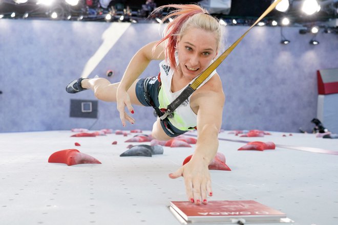 Janja Garnbret (na fotografiji) je v Tokiu očitno osvojila še veliko več kot le zlato kolajno. FOTO: Afp