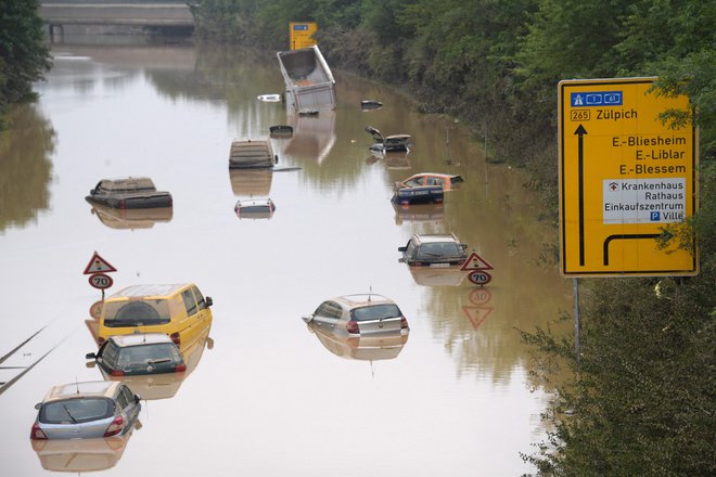 Prizor iz julijskih poplav v Nemčiji. FOTO: Sebastien Bozon/AFP