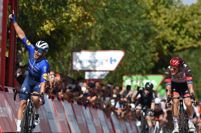 Florian Senechal je v 13. etapi Vuelte za največjo zmago v karieri presenetil vse šprinterje. FOTO: Jorge Guerrero/AFP