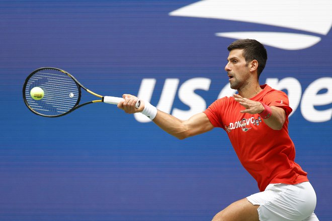 Đoković (na fotografiji) med sobotnim treningom v New Yorku. FOTO: Sarah Stier/AFP