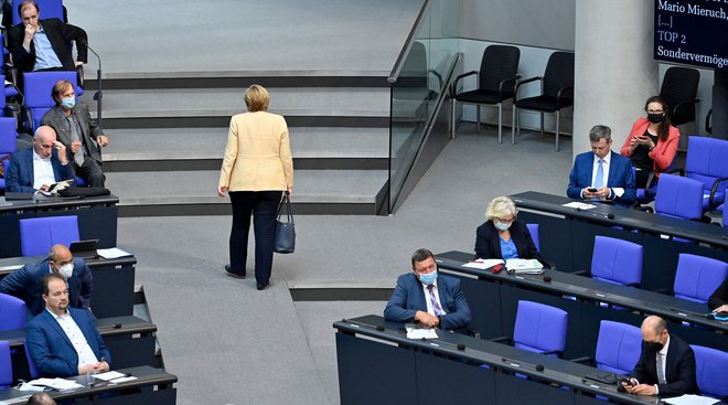 Nemška kanclerka Angela Merkel je na plenarnem zasedanju parlamenta predstavila dosežke svojega zadnjega mandata. FOTO John Macdougall/AFP