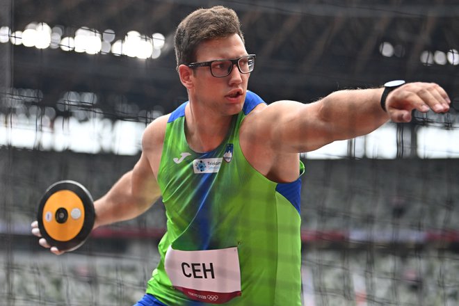 Kristjan Čeh je pristal na visokem drugem mestu v metu diska. FOTO: Ben Stansall/AFP