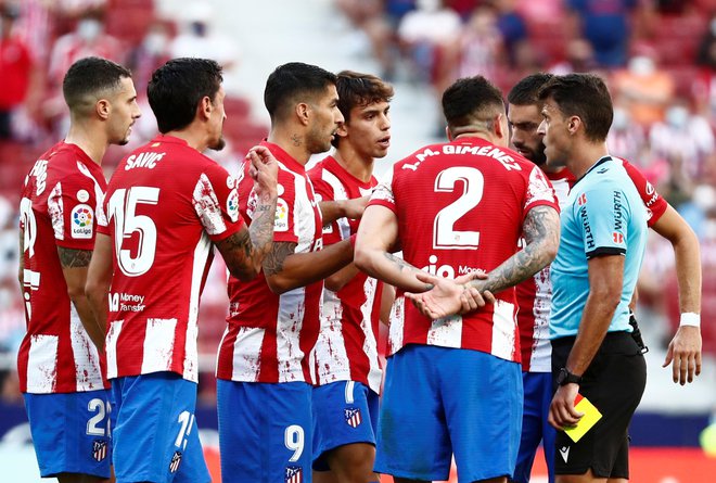 Atletico je zmago v zadnjih minutah lovil z desetimi nogometaši na zelenici. FOTO: Sergio Perez/Reuters