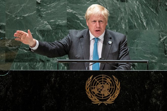 Britanski premier Boris Johnson je med nagovorom delegatov opozoril na pomen prihajajoče podnebne konference v Glasgowu. Foto Eduardo Munoz/AFP