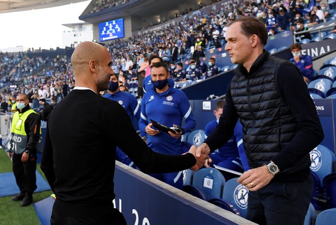 Trenerja ManCityja Pep Guardiola in Chelseaja Thomas Tuchel. Višje naj bi končal Španec. FOTO: Pierre-philippe Marcou/Reuters