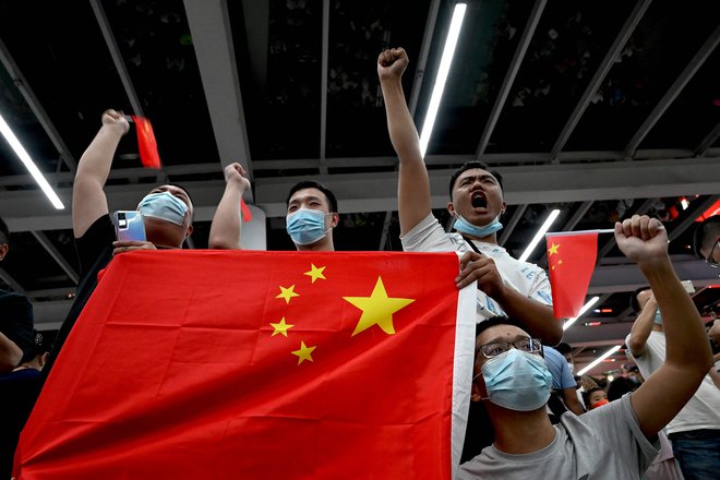 Nikomur se ne bo dobro godilo, če bo napadel Huawei, je preprosta ugotovitev, ki so jo ponudili kitajski javnosti. FOTO: Noel Celis/AFP