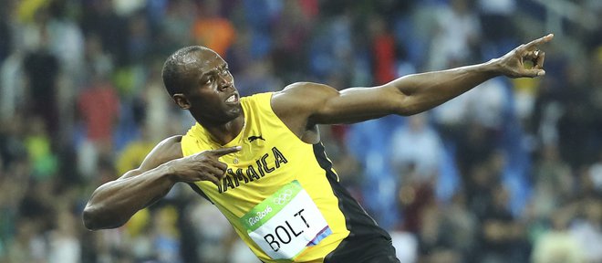 Usain Bolt zna poskrbeti za pozornost. FOTO: Lucy Nicholson/ Reuters