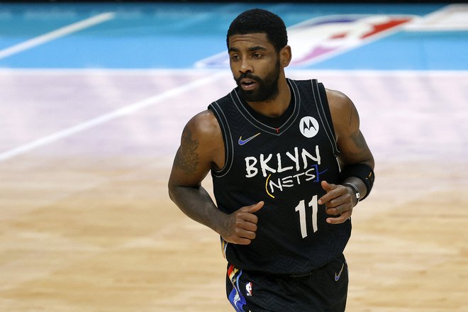 Kyrie Irving nasprotuje cepljenju. FOTO: Jared C. Tilton/AFP