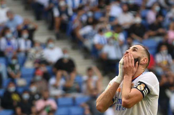 Karim Benzema (na fotografiji) je spet zadel, a tokrat s soigralci ni uspel uprizoriti čudežnega preobrata. FOTO: Lluis Gene/AFP