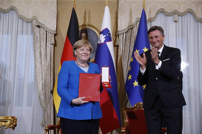 Kanclerka Angela Merkel se je Borutu Pahorju zahvalila za odlikovanje in dejala, da je počaščena. FOTO: Leon Vidic/Delo