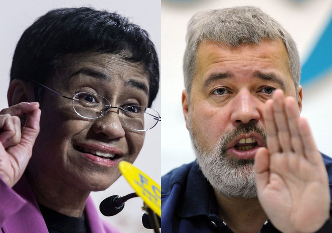 Maria Ressa, soustanoviteljica in direktorica filipinskega portala Rappler, in Dmitrij Muratov, urednik neodvisnega ruskega časnika Novaja Gazeta. FOTO: Yuri Kadobnov/AFP