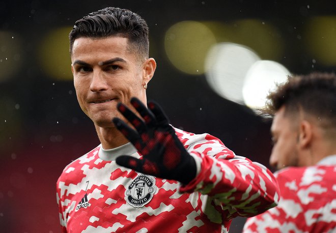 Cristiano Ronaldo trenutno igra za britanski Manchester United. FOTO: Oli Scarff/ AFP