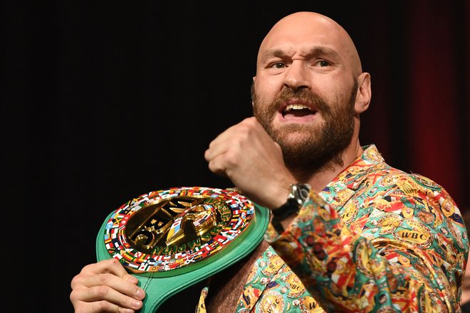 Tyson Fury je trdno odločen zadržati šampionski pas združenja WBC. FOTO: Robyn Beck/AFP