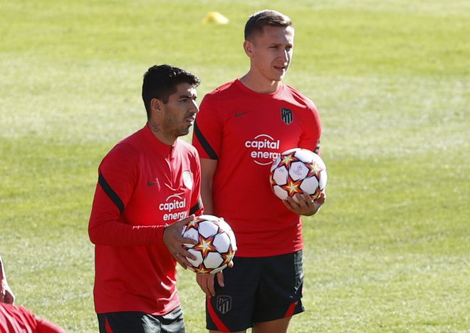 Luis Suarez in Ivan Šaponjić med treningom Atletica. FOTO: Juan Medina/Reuters
