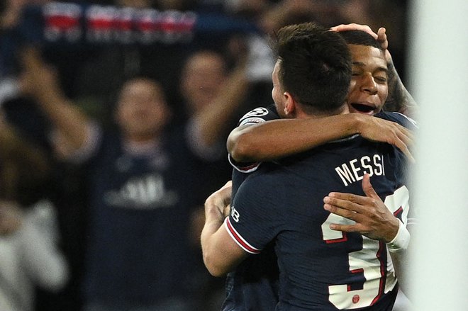 Lionel Messi in Kylian Mbappe sta odlično sodelovala med tekmo PSG in Leipziga. FOTO: Anne-christine Poujoulat/AFP
