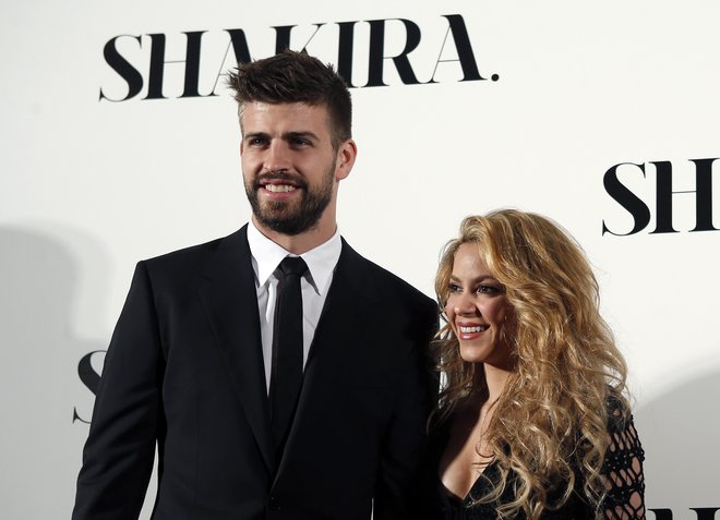 Gerard Pique in Shakira. FOTO: Albert Gea/Reuters
