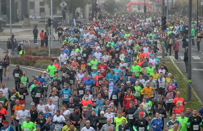 Tekaški praznik je na ulicah slovenske prestolnice zbral več kot 4000 ljubiteljev teka in rekreacije. FOTO: Blaž Samec

