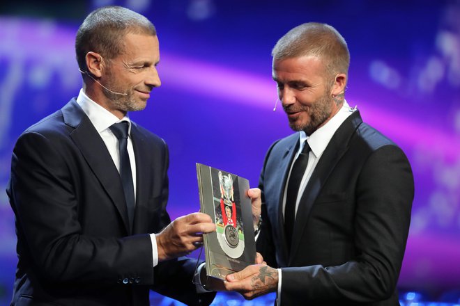 David Beckham (desno) v svetu nogometa in tudi zunaj njega velja za prijaznega in povsod rado videnega moža, zaradi česar se odlično znajde tudi v poslovnih vodah. FOTO: Valery Hache/AFP
