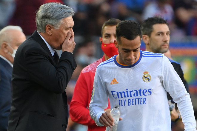 Carlo Ancelotti in strelec zmagovitega gola za Real na el clasicu Lucas Vazquez. FOTO: Lluis Gene/AFP
