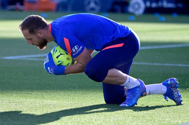 Vratar Jan Oblak bo sprejel velik izziv v tekmi Atletica z Betisom. FOTO: Javier Soriano/AFP
