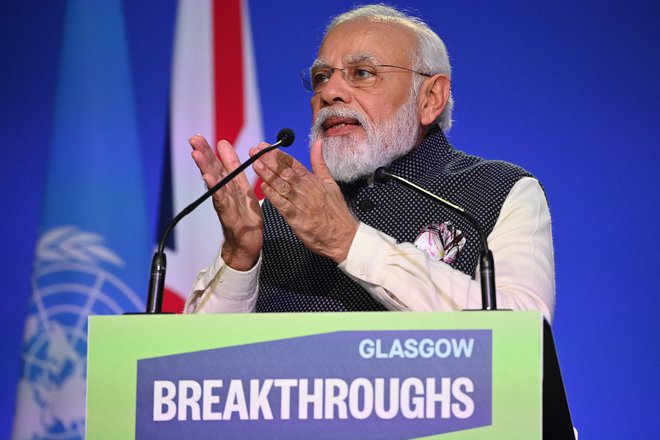 Premier Narendra Modi je opozoril, da predstavlja Indija 17 odstotkov globalnega prebivalstva, hkrati pa izpušča v ozračje komaj pet odstotkov vsega ogljikovega dioksida. FOTO: Jeff J Mitchell/AFP
