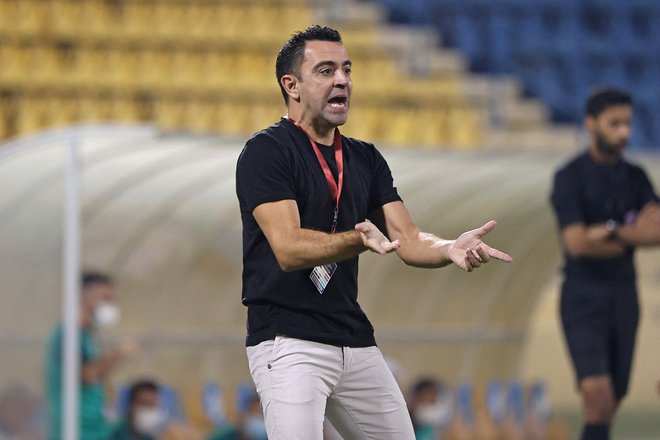 Kdaj se bo Xavi Hernandez vrnil v Barcelono in začel zdravljenje katalonskega nogometnega velikana, je le še stvar dneva ali ur. FOTO: Karim Jaafar/AFP
