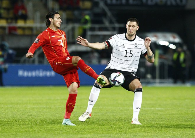 Niklas Süle (desno) ne bo igral proti Lihtenštajnu in Armeniji. FOTO: Ognen Teofilovski/Reuters
